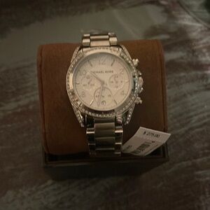 Brand new with tags/box. Don’t let too much time pass on this attention grabber!